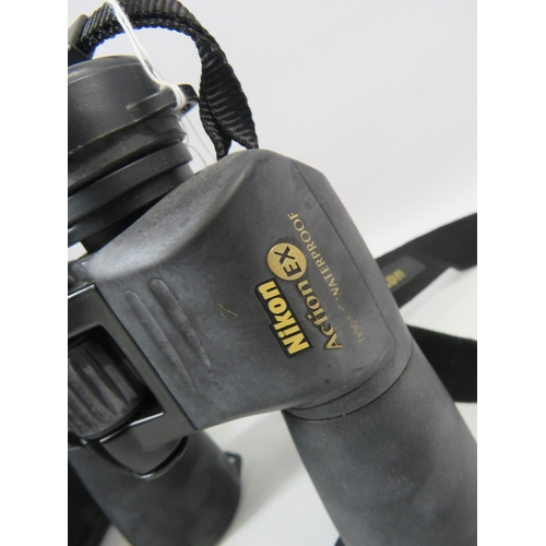 854 - Nikon action ex 7 X 50 binoculars and case.