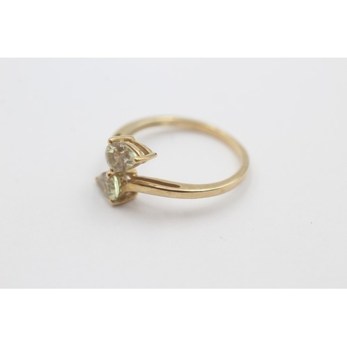 44 - 10ct gold chrysoberyl twin stones stylised floral setting ring (1.7g)     798337    Ring Size'O'