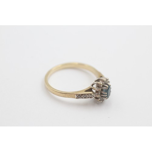 51 - 9ct gold blue topaz & diamond halo dress ring (2g)     808789   Ring Size 'L'