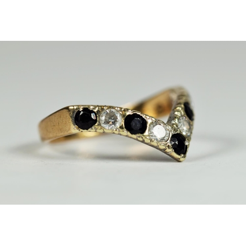 163 - 9ct Yellow Gold Sapphire & CZ set wishbone ring.  Finger size 'M'  2.1g