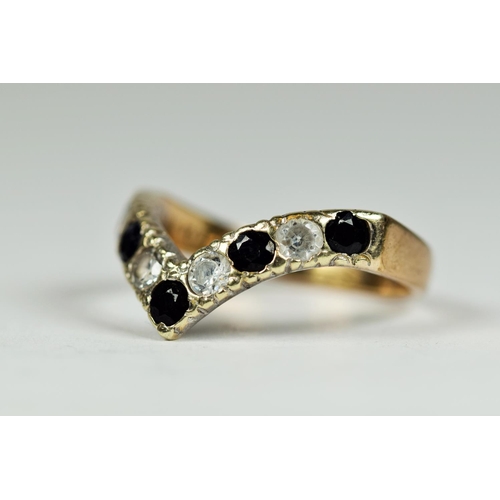 163 - 9ct Yellow Gold Sapphire & CZ set wishbone ring.  Finger size 'M'  2.1g