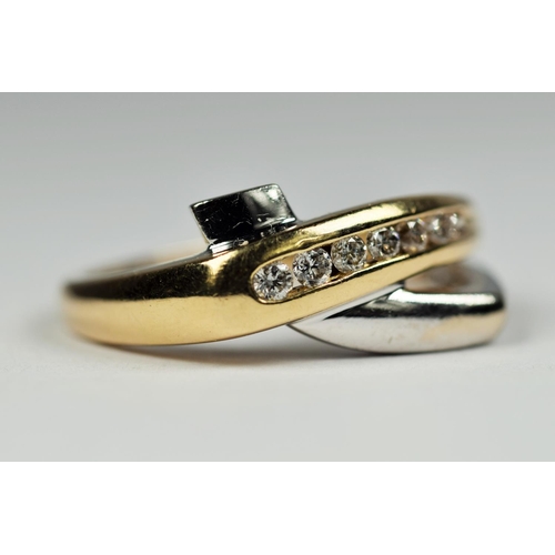 195 - 14ct, Yellow & White Gold ring set with seven Diamonds in a Channel setting.  Finger size M-5'    3.... 