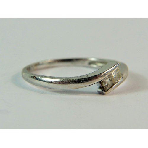 214 - 9ct White Gold ring set with Twin Diamonds of 0.15pts total.  Finger size 'M'   1.9g   165-29-9