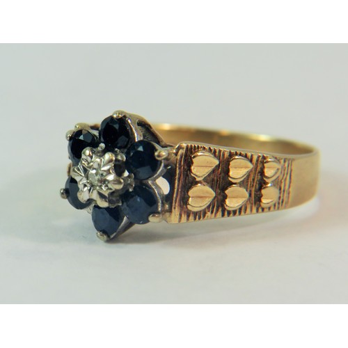 208 - 9ct Yellow Gold ring set with Small 150th pt Diamond and Six 10mm Sapphires. Finger size  'P-5'  3.7... 