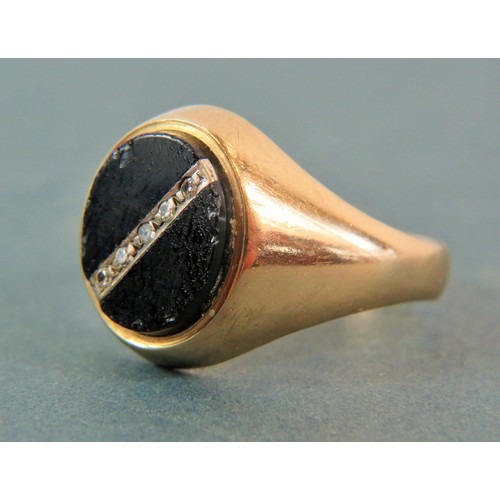 202 - 9ct Yellow Gold Gents signet ring set with an Oval stone with Five Diamonds inset. Finger size T-5  ... 