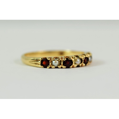 213 - 9ct Yellow Gold Garnet and Pearl set ring. Finger size 'N'   1.7g