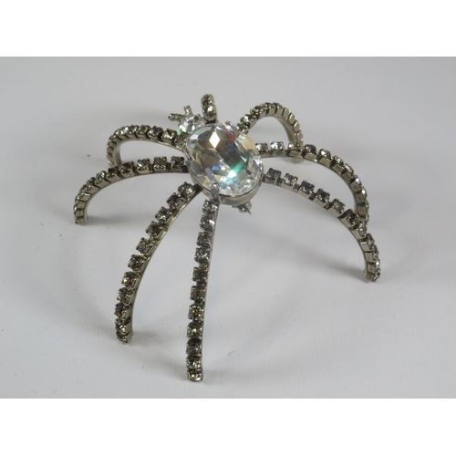 241 - Butler and Wilson 1980s Large spider diamonte brooch. Approx 10cm diameter.