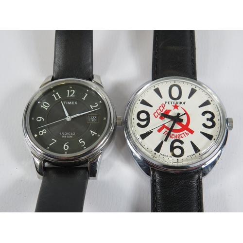 244 - 2 Mens wristwatches, Peter Hof Russian 19 jewel mechanical and a Timex indiglo quartz. Both in worki... 