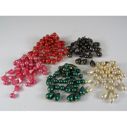 256 - 5 Faux pearl brooches.