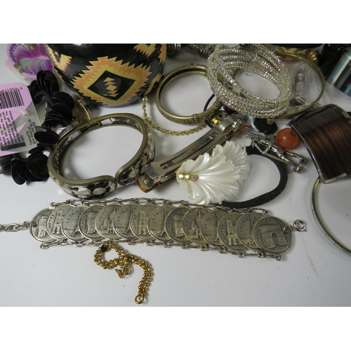 266 - Large quantity of costume jewellery including necklaces, bracelets, hair clips etc.