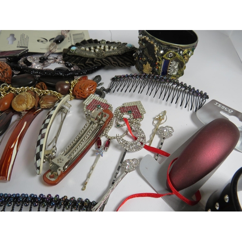 266 - Large quantity of costume jewellery including necklaces, bracelets, hair clips etc.