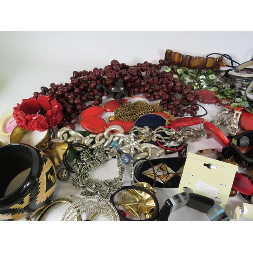 266 - Large quantity of costume jewellery including necklaces, bracelets, hair clips etc.