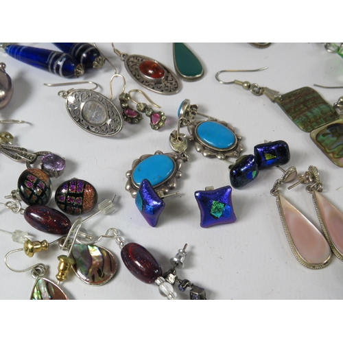 267 - Large selection of earrings many of which are sterling silver.