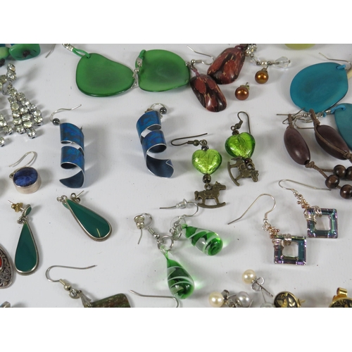 267 - Large selection of earrings many of which are sterling silver.