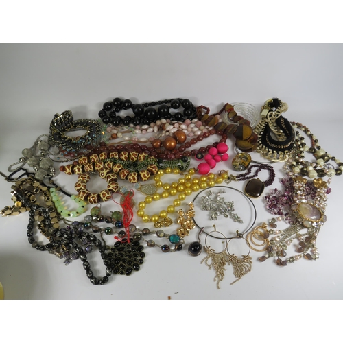 268 - Large selection of costume jewelley necklaces and earrings including some sterling silver.