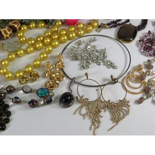 268 - Large selection of costume jewelley necklaces and earrings including some sterling silver.