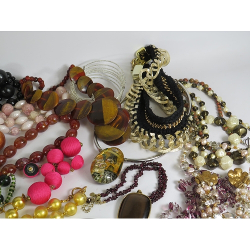 268 - Large selection of costume jewelley necklaces and earrings including some sterling silver.