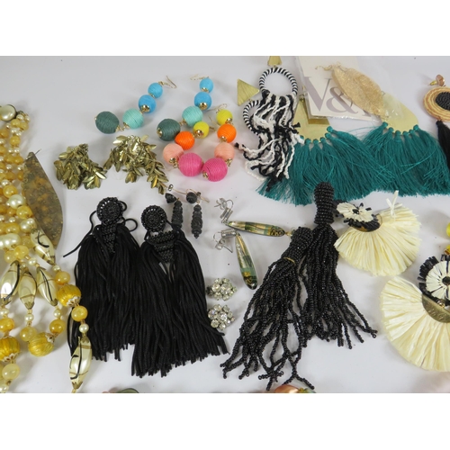 271 - Selection of statement earrings and beadded necklaces.