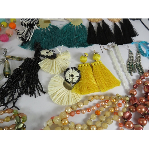 271 - Selection of statement earrings and beadded necklaces.