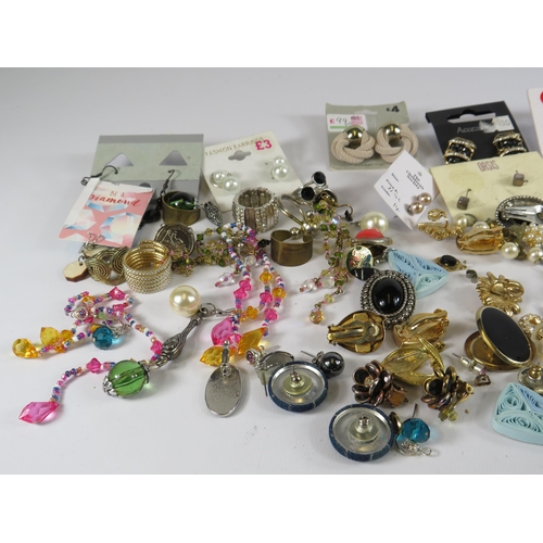 273 - Selection of costume jewellery rings and earrings.