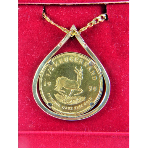 238 - Half Krugerrand pendant set on a 9ct Yellow gold mount and hung on a 9ct 22 inch chain.  Total weigh... 