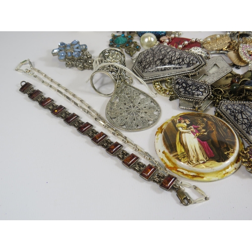 275 - Large selection of costume jewellery including a 925 silver bracelet and necklace.