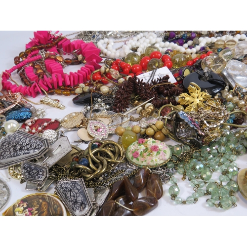 275 - Large selection of costume jewellery including a 925 silver bracelet and necklace.