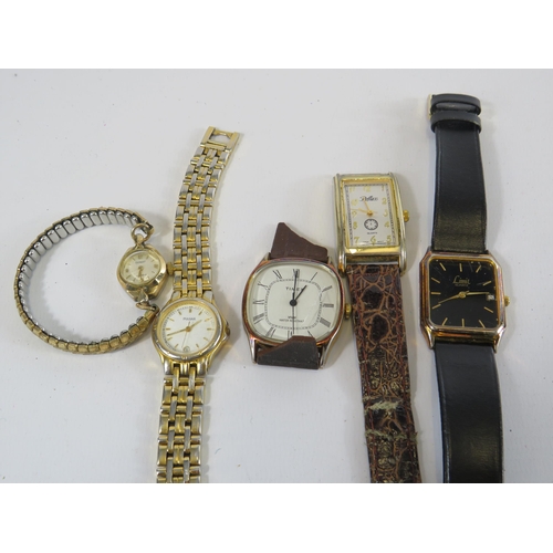 282 - Ladies mechanical wristwatch in working condition and 4 quartz wristwatches all in need of new batte... 