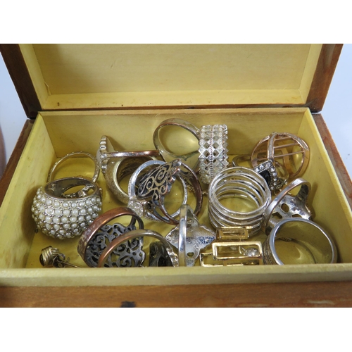 284 - 2 Jewellery boxes and costume jewellery contents.