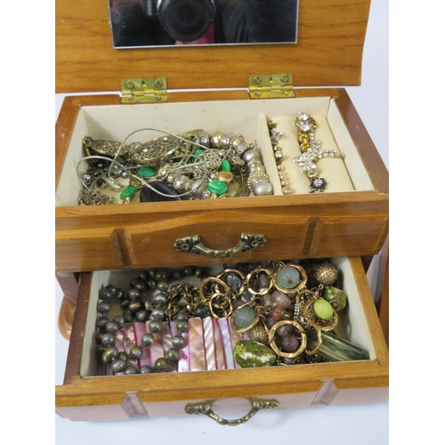 284 - 2 Jewellery boxes and costume jewellery contents.