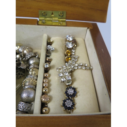 284 - 2 Jewellery boxes and costume jewellery contents.