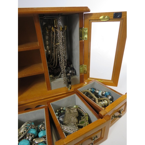 285 - 2 Jewellery boxes and costume jewellery contents.