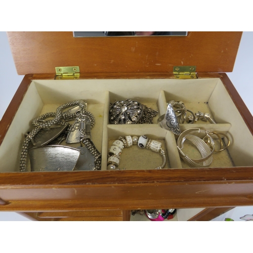 286 - Large jewellery box and costume jewellery contents.