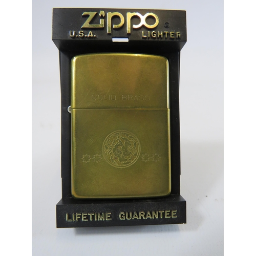 289 - Solid brass Zippo lighter with box.