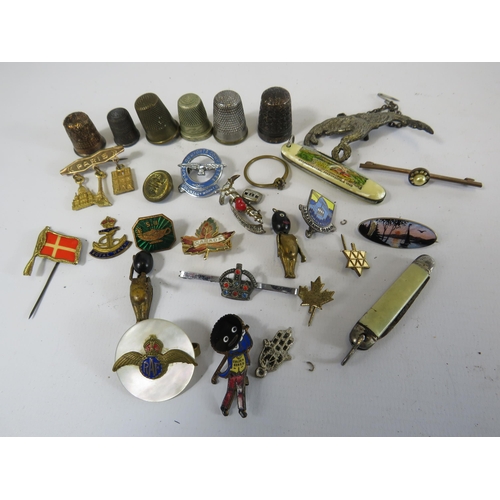 290 - Small mixed collectables lot to include Thimbles, badges, pen knives etc some sterling silver.