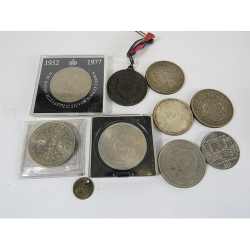 291 - Selection of vintage commemorative coins including a 1937 Crown and a 1934 peace dollar.