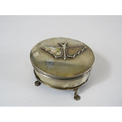 299 - Sterling silver trinket box on bun feet decorated with a butterfly with Mop wings.