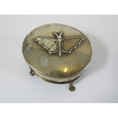 299 - Sterling silver trinket box on bun feet decorated with a butterfly with Mop wings.