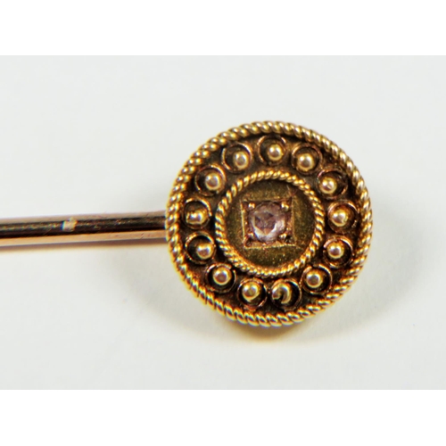 311 - Antique, 15ct gold lapel pin set with an old cushion cut Diamond of 2mm diameter 1.8g , Supplied wit... 