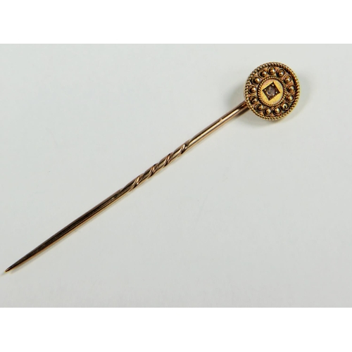 311 - Antique, 15ct gold lapel pin set with an old cushion cut Diamond of 2mm diameter 1.8g , Supplied wit... 