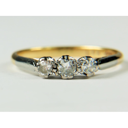 312 - 18ct Diamond set ring with Platinum mount.  Central Diamond 0.10pts, two sister Diamonds are 0.7pts ... 