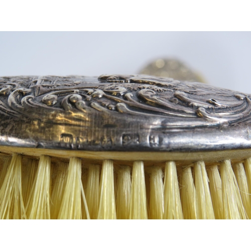 324 - 4 Sterling silver backed dressing table brushes all with hallmarks for Birmingham.