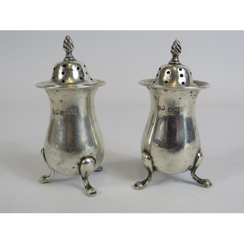 325 - Pair of sterling silver salt and pepper pots hallmarked for Birmingham 56.6 grams in total.