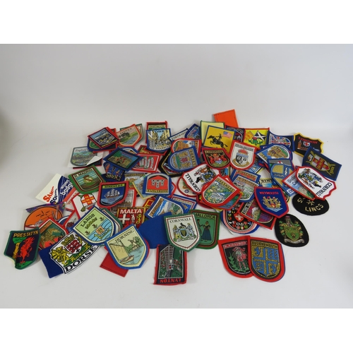 336 - 100 + Material sew on patches mainly souvenir patches.