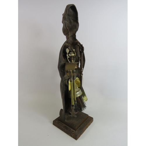 35 - Vintage Bronze effect cast fire side companion set in the form of a boy which stands approx 20.5