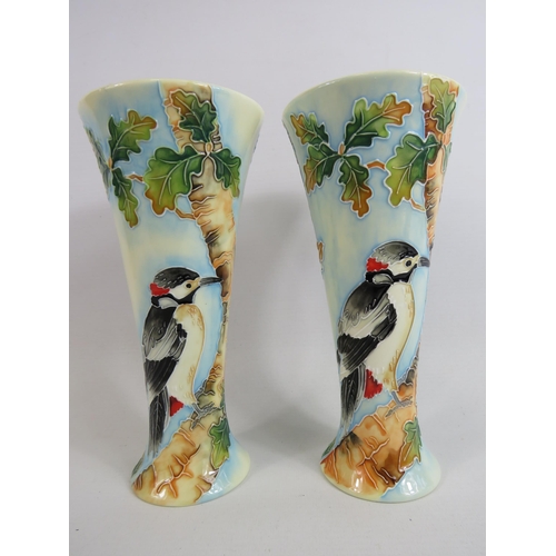 71 - A Pair of Old Tupton ware vases decorated with Woodpeckers. Approx 7 3/4