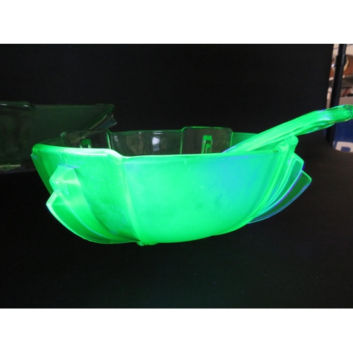 74 - 2 large Art deco uranium green glass bowls and a pair of salad servers.