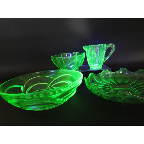 76 - 2 large Art deco uranium green glass bowls and a milk jug and sugar bowl.