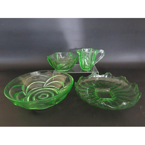 76 - 2 large Art deco uranium green glass bowls and a milk jug and sugar bowl.