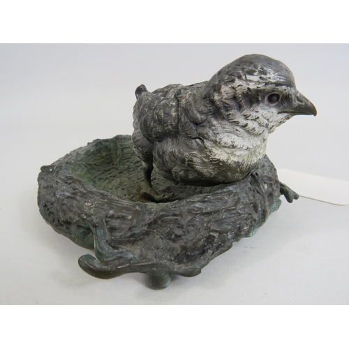 85 - Antique Bronze ink well of a chick in a nest. 6.5